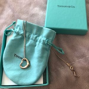 Tiffany and Co. open heart silver necklace. New